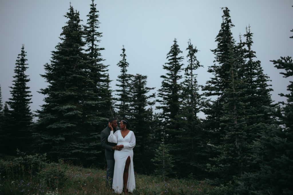 Couple embracing after their elopement in the forest at Olympic National Park in Washington
